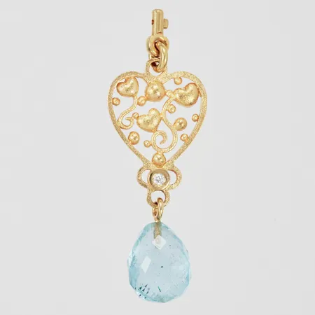 Smyckesdel till lås Ole Lynggaard med diamant ca 1x0,02ct samt topas längd: ca 3,5cm bredd: ca 13mm, 18K Vikt: 2,7 g