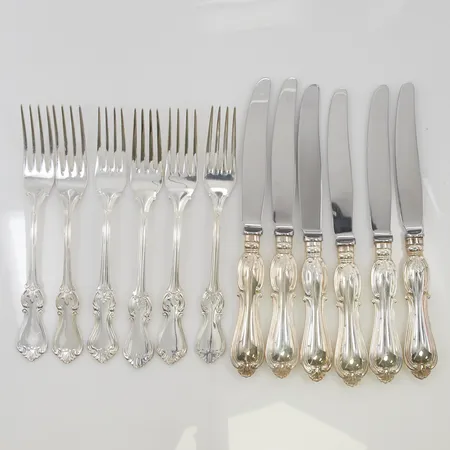 6 Gafflar 18cm, 6 Knivar 21cm, 830/1000 Silver 728,5g.