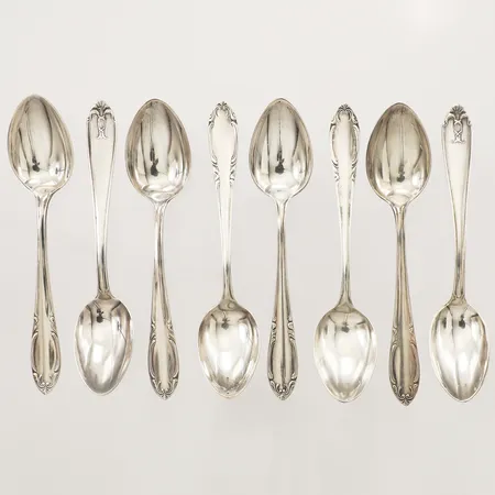 Åtta kaffeskedar längd ca 11cm, olika modeller gravyr silver 830/1000  Vikt: 101,8 g