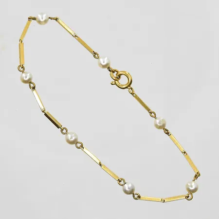 Armband med imitationspärlor Ø4mm, längd 17½cm, länkens bredd 1mm, 18K. Vikt: 2,4 g
