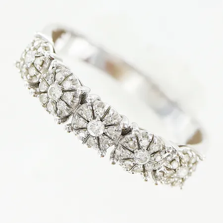 Ring diamanter ca 0,25ctv, stl:18¾, GHA, vitguld, 18K. Vikt: 3 g