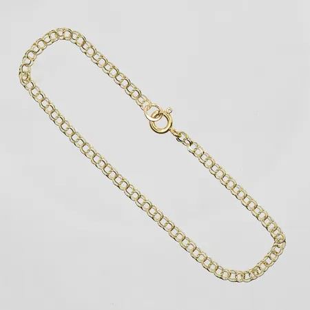 Armband Bismarck längd 18½cm, bredd 3mm, 18K. Vikt: 1,6 g
