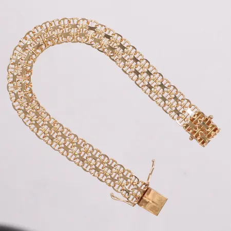 Armband X-länk med stav längd 18,5cm bredd 10,1mm Styletta Guldvaruaktiebolaget år1971 kistlås 18K Vikt: 15,4 g
