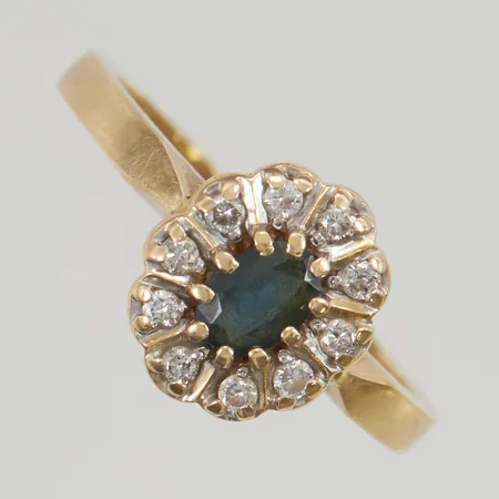 Ring med diamanter 10x ca 0,02ct, safir, stl:19 bredd 12mm 18K 4,2g.