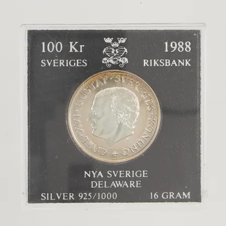 Minnesmynt 100kr Nya Sverige Delaware år 1988, Ø32mm, etui, 925/1000 Silver 16,0g.