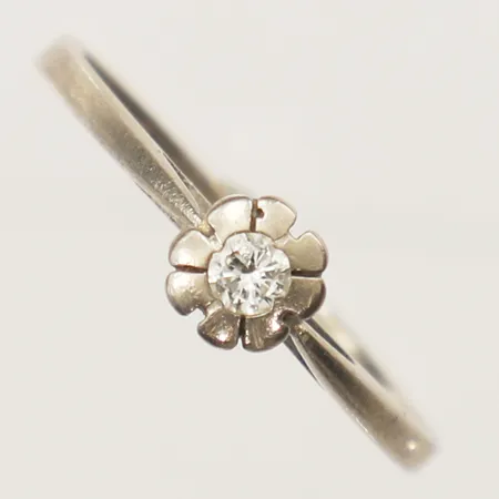 Ring med diamant 1x0,06ct enligt gravyr stl:16½ vitguld 18K  Vikt: 2,3 g