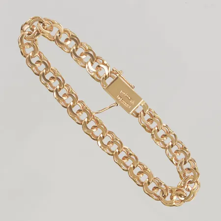 Armband 18cm bredd 7mm defekt låsåtta 18K 13,2g.