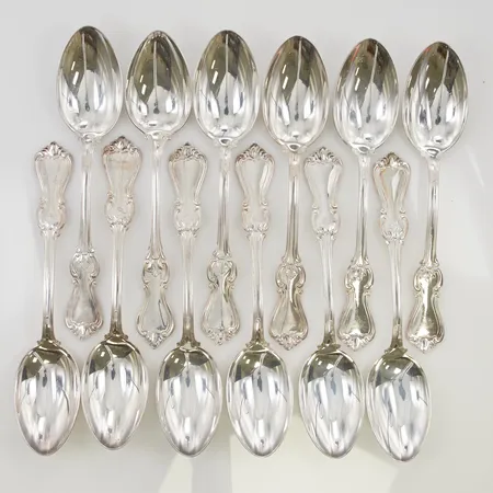 12 Matskedar 18cm gravyr 830/1000 Silver 558,8g.
