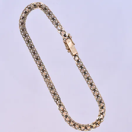 Armband X-länk längd 19,5 cm, bredd 4 mm 2st X defekt 18K. Vikt: 6,1 g