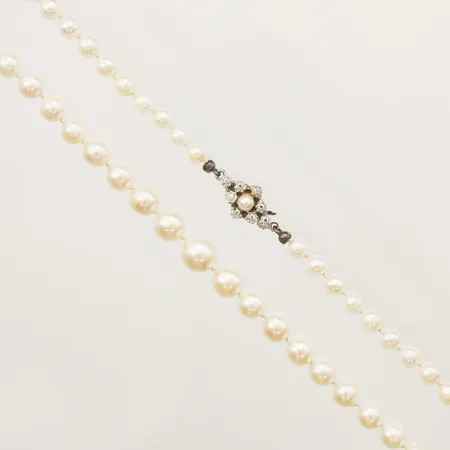 Pärlcollier doserade odlade pärlor längd 50cm, Ø4-8,2mm lås med vita stenar silver 835/1000 Vikt: 20,5 g