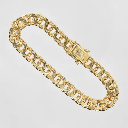 Armband Bismarck längd 19cm, bredd 8mm, 18K. Vikt: 25,5 g