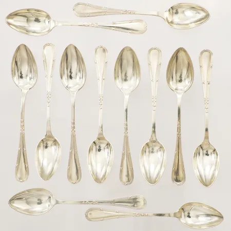 Tolv mockaskedar modell rosett, längd 11cm GAB gravyr silver 830/1000 Vikt: 130,1 g