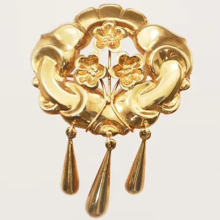 Brosch med hängande droppar längd 33mm, bredd 46mm 18K  Vikt: 5,7 g