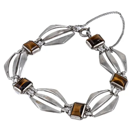 Armband med tigeröga. Längd 20 cm. Bredd 10 - 16,8 mm. Säkerhetskedja. Silver 835/1000 14,0g.