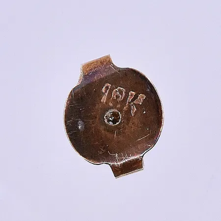 En stopp Ø6 mm 18K. Vikt: 0,3 g