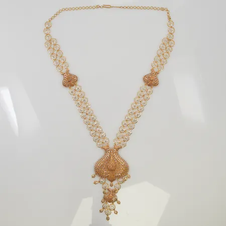 Collier ca 64cm bredd 10-120mm detaljer i vitguld, 21K 66,4g.