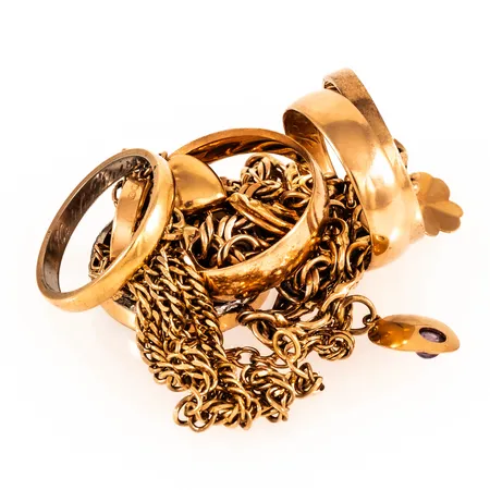 Diverse defekt/graverat guld 18K 47,8g.