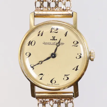 Damur Jaeger Le-Coultre 18K Ø23mm boett nr. 6038.21 snr. 1381628 manuell uppdragning, ca 1960/70-tal, med x-länk i guld 18K, smärre slitage, bruttovikt 26,6g  