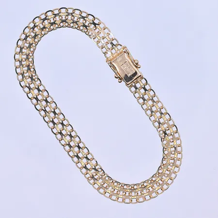 Armband X-länk längd 18,5 cm, bredd 7 mm 18K. Vikt: 8 g