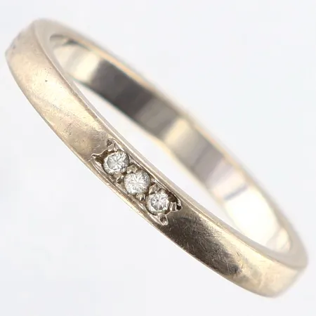 Ring med diamanter totalt 0,03 enligt gravyr, stl: 17¼, bredd: 2,5mm, vitguld, 18K Vikt: 3 g