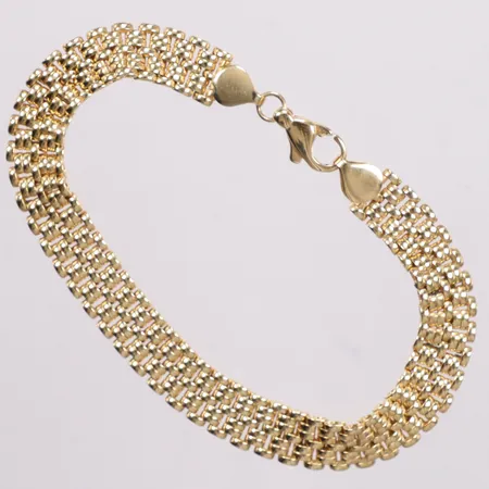 Armband längd 19,5cm bredd 8,5mm Guldfynd 18K Vikt: 13,3 g