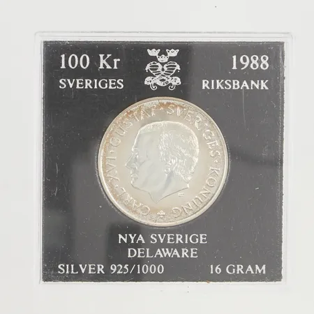 Minnesmynt 100kr Nya Sverige Delaware år 1988, Ø32mm, etui, 925/1000 Silver 16,0g.