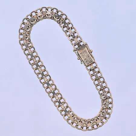 Armband X-länk längd 18,5 cm, bredd 7 mm 18K. Vikt: 12,5 g