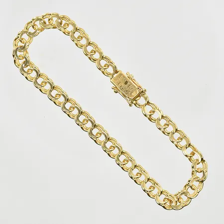 Armband Bismarck längd 20½cm, bredd 6mm, 18K. Vikt: 14,7 g