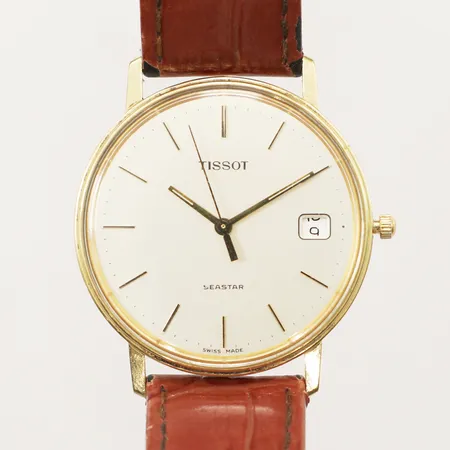 Herrur Tissot Seastar 18K, Ø34 mm datum gravyr "För nit och redlighet i rikets tjänst", slitet läderband, går ej