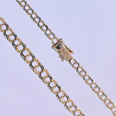 Collier doserad Bismarck längd 46,5 cm, bredd 3-5 mm 18K. Vikt: 9,1 g