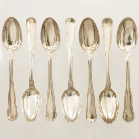 Sju efterrättsskedar modell gammal dansk, längd 14,5cm silver 830/1000 Vikt: 120,5 g