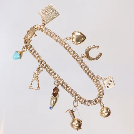 Armband Bismarck med nio berlocker (delvis med sten/emalj) 19cm bredd 5mm (länken) CBH Köping, 18K Vikt: 22 g