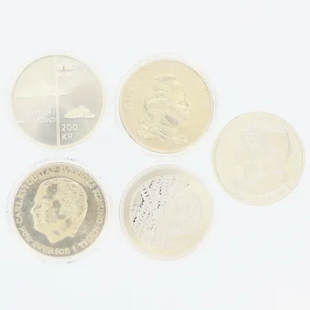 5 Minnesmynt 200-kronor, caØ36mm, 4 plastetui, 925/1000 silver  Vikt: 136,7 g