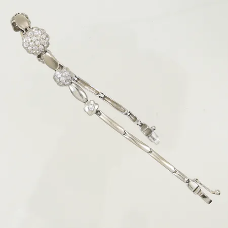 Armband vitguld med vita stenar, längd 18cm bredd 2,5-10mm, 18K 11,7g totalt