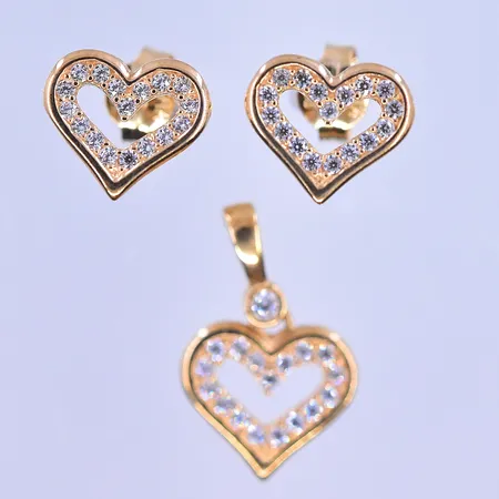 Örhängen stl:8x9 mm och hänge med vita stenar stl:16x10 mm Guldfynd 18K. Vikt: 1,8 g