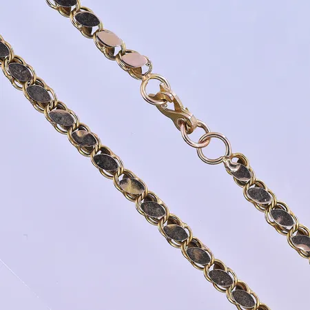 Collier längd 51,5 cm, bredd 4 mm 18K. Vikt: 7,8 g