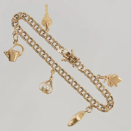 Armband 19cm berlocker 18K 13,1g.