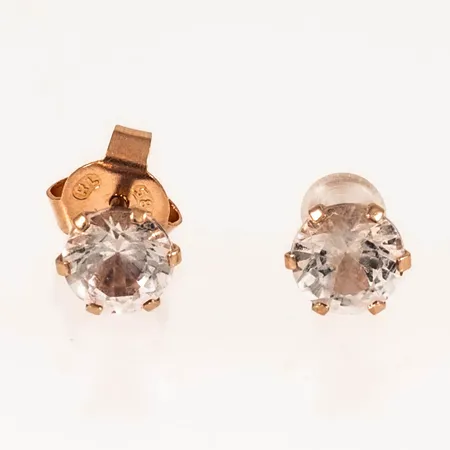 Örhängen med vita stenar Ø5,7mm, en snurrebuss saknas, men ny i plast ingår, 14K 0,7g.