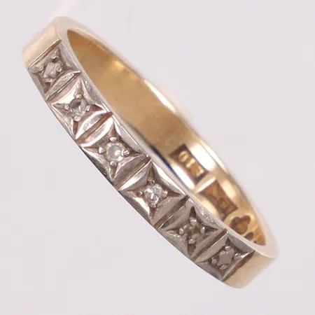 Ring tvåfärgad med diamanter 6st på totalt 0,04ct enligt gravyr stl 17½ Örneus Guldsmeds Ab O, år 1979, 18K Vikt: 2,7 g