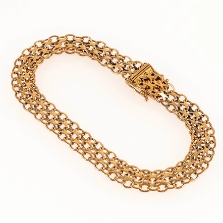 Armband X-länk längd 20cm bredd 8,5mm, ojämnheter, 18K 12,4g.