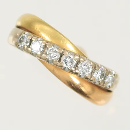 Ring trefärgad med 7 diamanter totalt 0,50ctv enligt gravyr stl 17½, bredd 6mm, stämplad GFAB, 18K, 8,4g Vikt: 8,4 g