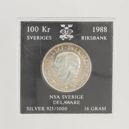Minnesmynt 100kr Nya Sverige Delaware år 1988, Ø32mm, etui, 925/1000 Silver 16,0g.