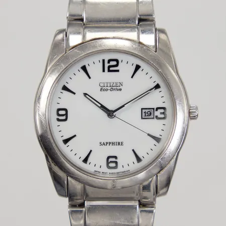 Herrur Citizen, Eco-Drive, Ø ca 40mm, serienummer 702074, referensnummer S04892, kvartsur, datum, stål med länk, ca 17,5cm, extra länkbitar, inga övriga tillbehör.