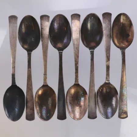 8 skedar, längd 18,5cm, modell Rosenholm, GAB, oxiderade, 830/1000 silver Vikt: 333,4 g