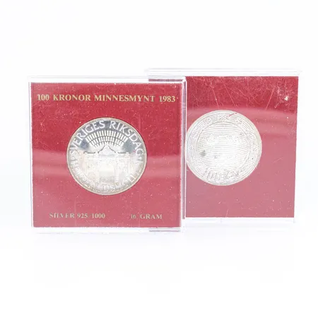 2 Minnesmynt Sveriges Riksdag Helgeandsholmen år 1983 100Kr Ø32mm, i plastetui, silver 925/1000 á 16,0g. 