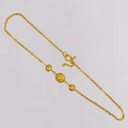 Armband guldkulor längd 17cm bredd 0,7-5mm 23K Vikt: 1,9 g