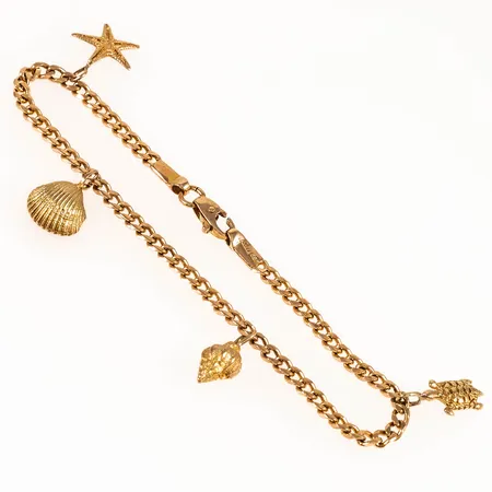 Armband gles pansar med fyra berlocker: snäckor, sköldpadda. Längd 21cm bredd 3,2mm, 14K 11,5g. 