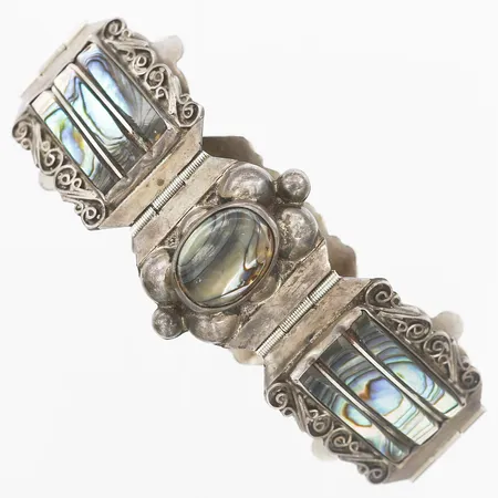 Armband med pauasnäckor, längd 18cm, bredd 32mm,  tillverkat i Mexiko, silver 925/1000 Vikt: 44,3 g