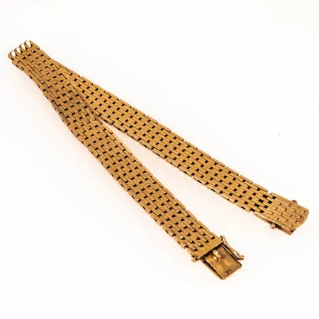 Armband Korridor längd 19,5cm bredd 8,8mm, ojämnheter/vridning i länk, en säkerhetsåtta saknas, 18K 24,4g.  