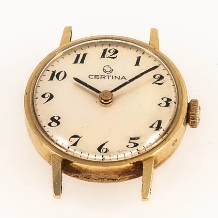 Damur Certina 14K utan band bruttovikt 10,6g. Ø 22 mm. Manuellt urverk. Repigt plastglas.